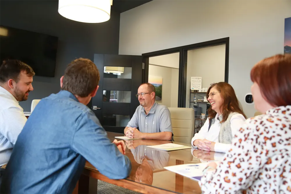 Sanford & Associates CPA team meeting with clients in Springfield, MO